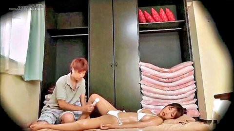 Japanese bikini babe with huge tits gets thigh lotion massage by red-haired guy