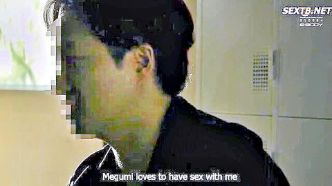 Blurry Japanese man in locker room with censored face and text Megumi loves to have sex with me