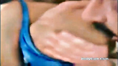 Amanda White in blue top teasing massive boobs close-up