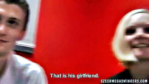 Amateur swinger couple: smiling blonde girlfriend and her boyfriend