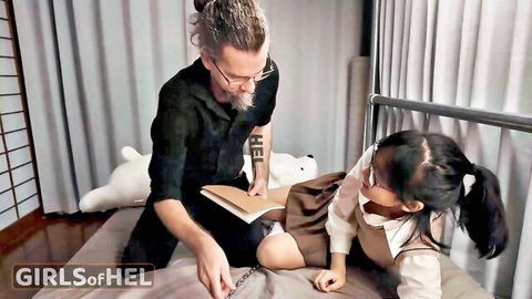 Older man dominates young Asian schoolgirl in uniform, groping her thigh on bed with teddy bear