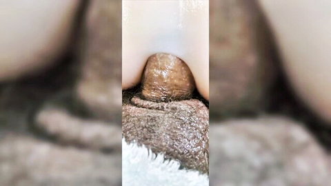 Close-up anal penetration of sex doll's ass in explicit view