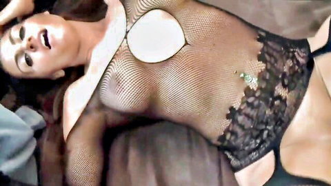 Sumptuous Andrea in seductive fishnet lingerie pose, teasing viewer