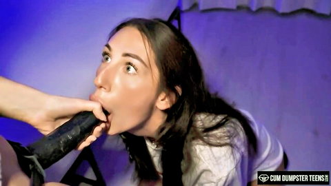 Brunette teen deepthroats black dildo in Cum Dumpster Teens trailer