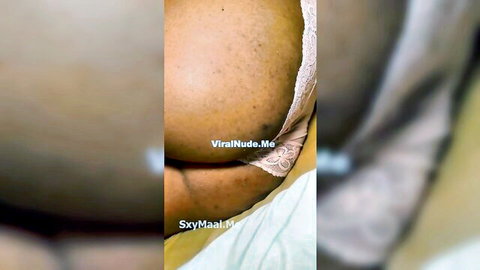 South Asian babe's thick brown ass cheeks spilling out of pink lace panties