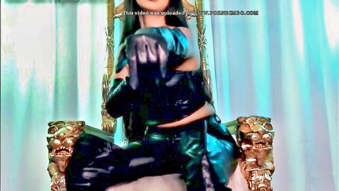 Empress Jennifer in black leather outfit, dominant pose on throne