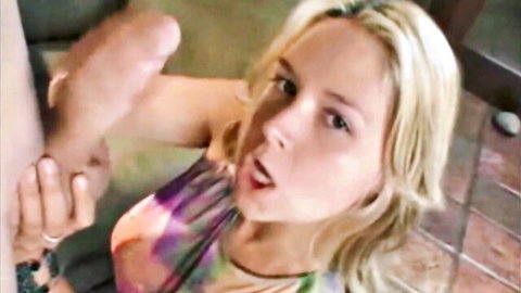 Blonde in dress gives softcore outdoor handjob closeup