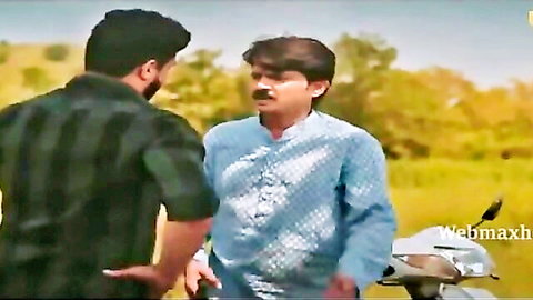 Two Indian men in casual chat outdoors, Ullu web series scene Dil to Bachha hai Part 02