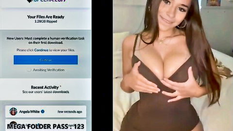 Angela White teasing in tight black dress with deep cleavage