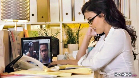 Dillion Harper in office video call with Chad White