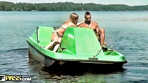 Busty blonde in bikini fucked hard on green boat by lake