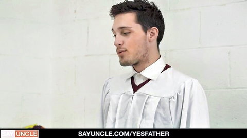 Young grad in cap and gown, slim build, dark curly hair, seductive pose