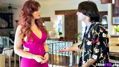 Busty redhead MILF in tight pink dress with deep cleavage talks to stepson in kitchen