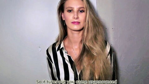 Blonde Svetlana in open striped shirt, teasing cleavage and smile