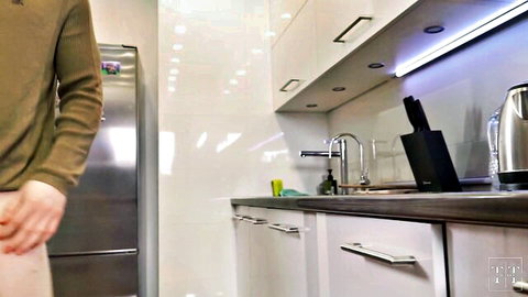 Tim Deen teasing crotch in modern kitchen apartment scene