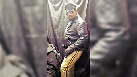 Leaubbon in sexy leather cop outfit, posing confidently