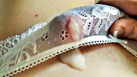 Cock head with thick cumshot dripping onto white lace panties pulled aside exposing wet skin