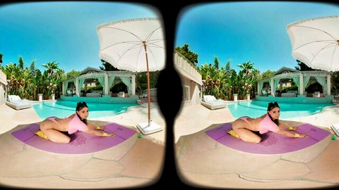 Curvy brunette babe with huge tits and big ass in pink thong bikini poses seductively on poolside yoga mat VR
