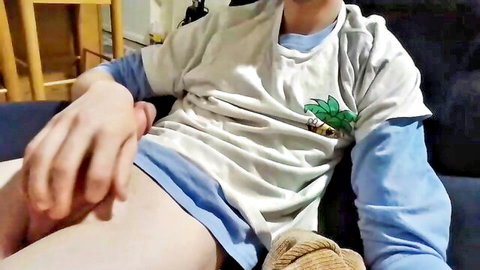 Petite gay twink spreads legs pulling down shorts to stroke hard cock on webcam solo