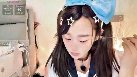 Yueyue2003 Asian camgirl in schoolgirl outfit, long hair and choker