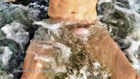 Solo boy nude in foamy water, close-up crotch exposure