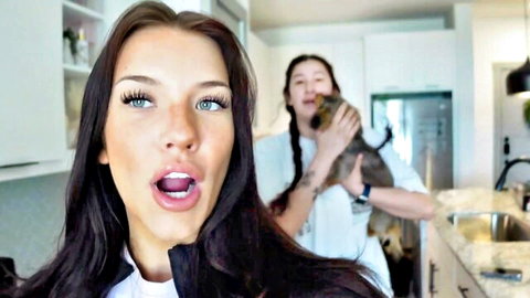 Excited brunette women with puppy in casual white tops, Fionamaefit vlog thumbnail