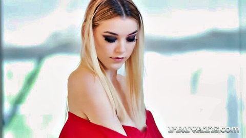 Anny Aurora in seductive red off-shoulder dress, blonde beauty teasing cleavage