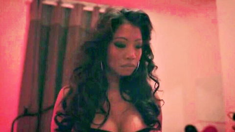 Chrissie Wunna showing cleavage in black top, Dirty Games 2022 kinky party