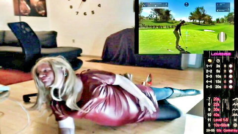 Wicki von Trannyston in shiny red dress, teasing solo with LUSH toy control
