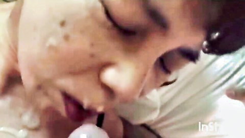 Amateur Asian mom in fishnets giving intense blowjob closeup