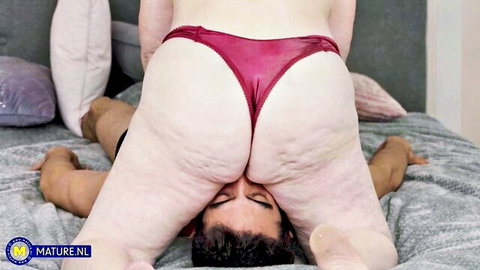 Mature BBW Noretta facesitting Mark Zane in red lingerie femdom