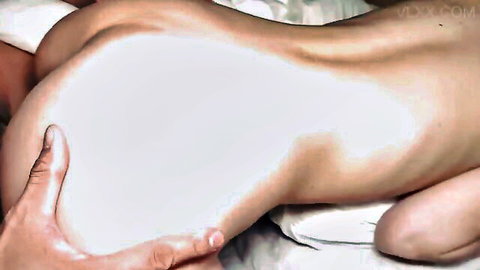 Hand spreading petite Japanese girl's big ass cheeks exposing censored tight pussy and anus closeup