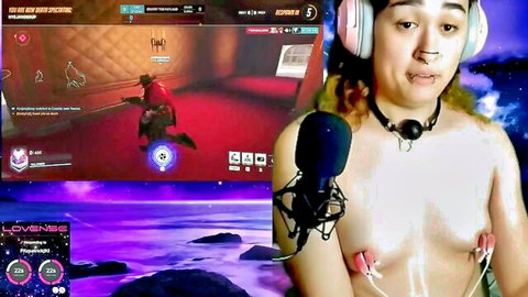 Cute Transgirl Solumie drooling with ball gag, topless nipple clamps during Overwatch stream