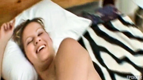 Smiling blonde beauty in bed, deep throat expert