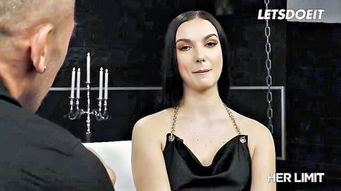 Lady Gang in sexy black chain dress faces bald man in teasing encounter