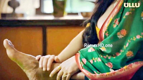Curvy Indian MILF in green saree erotic pose with foot tease