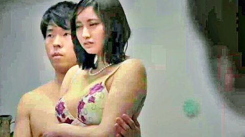 Asian couple in floral lingerie embrace, teasing cuckold nude photoshoot