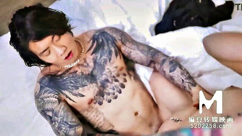 Ai Qiu in intense bedroom sex with tattooed Asian hunk