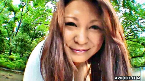Airi Ai, Japanese MILF smiling outdoors in white top, vibrator tease