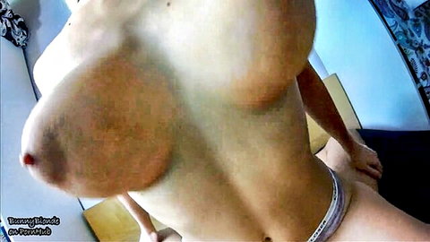Amateur MILF with massive natural tits topless in morning tease