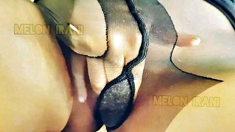Iranian babe's wet shaved pussy fingered deep through black sheer stockings closeup