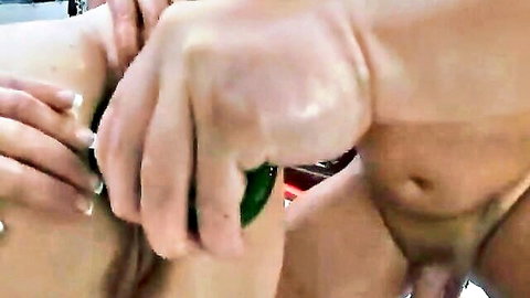 Babe inserts thick green dildo deep into muscular guy's tight asshole in intense pegging.