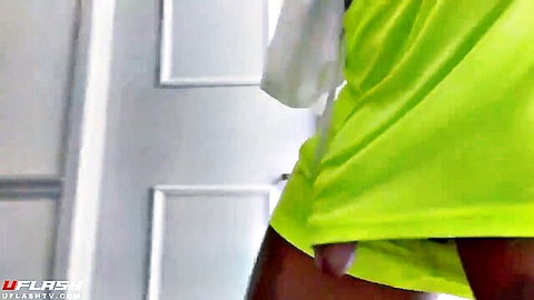 Ebony shemale flashing hard cock in tight green dress while walking