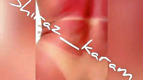 Arab transsexual in close-up explicit pose, Shiraz Kararam text overlay