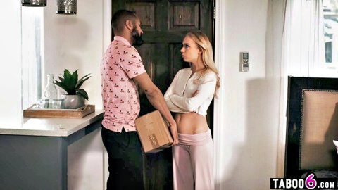 Petite blonde in crop top and pants faces bearded black man holding package at door