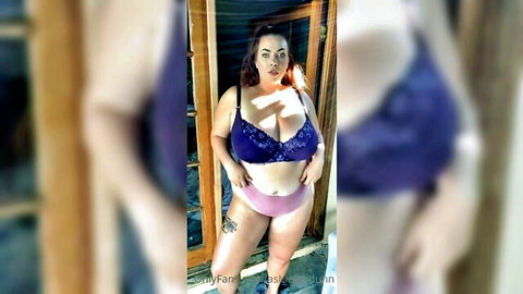 Curvy brunette with massive tits in purple bra and pink panties posing seductively outdoors
