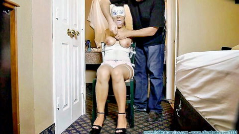 Ellen bound and blindfolded in white lingerie, man groping her exposed tits