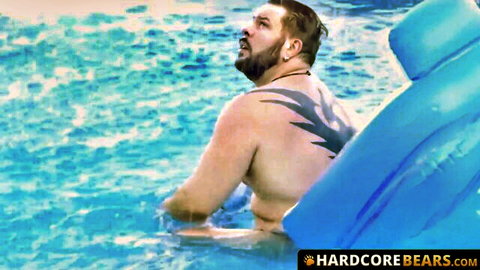 Adam Jones massive cub stroking cock outdoors by pool