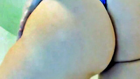 Curvy MILF showing off big ass in blue thong on webcam