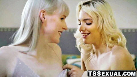 Two smiling blondes fondle each other's tits in sheer tops teasingly